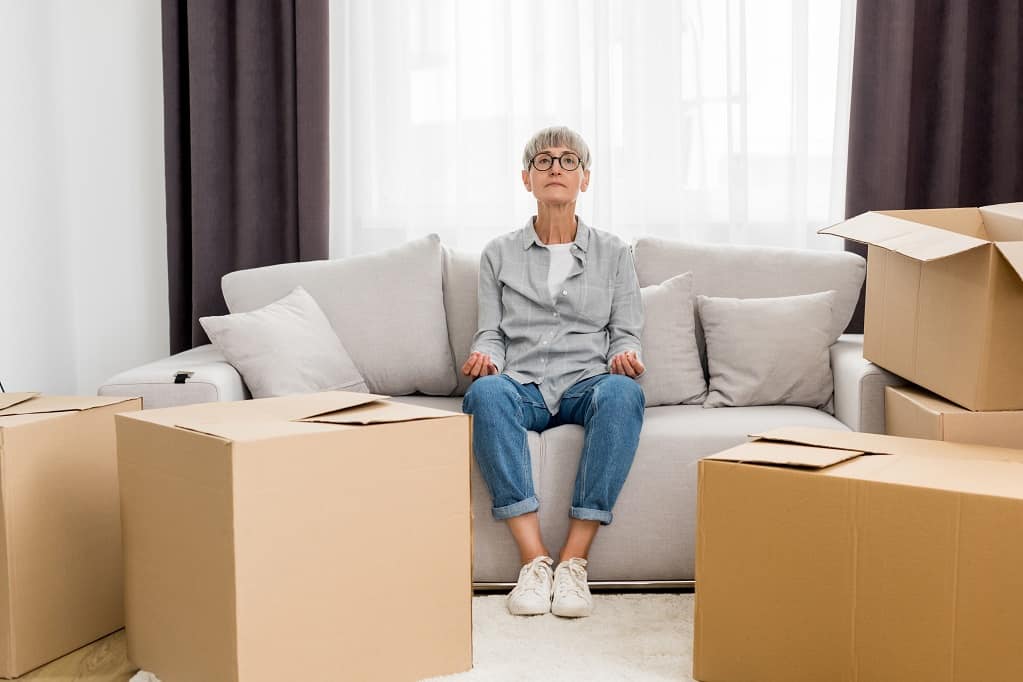 Woman seating on a couch